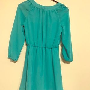 A turquoise dress